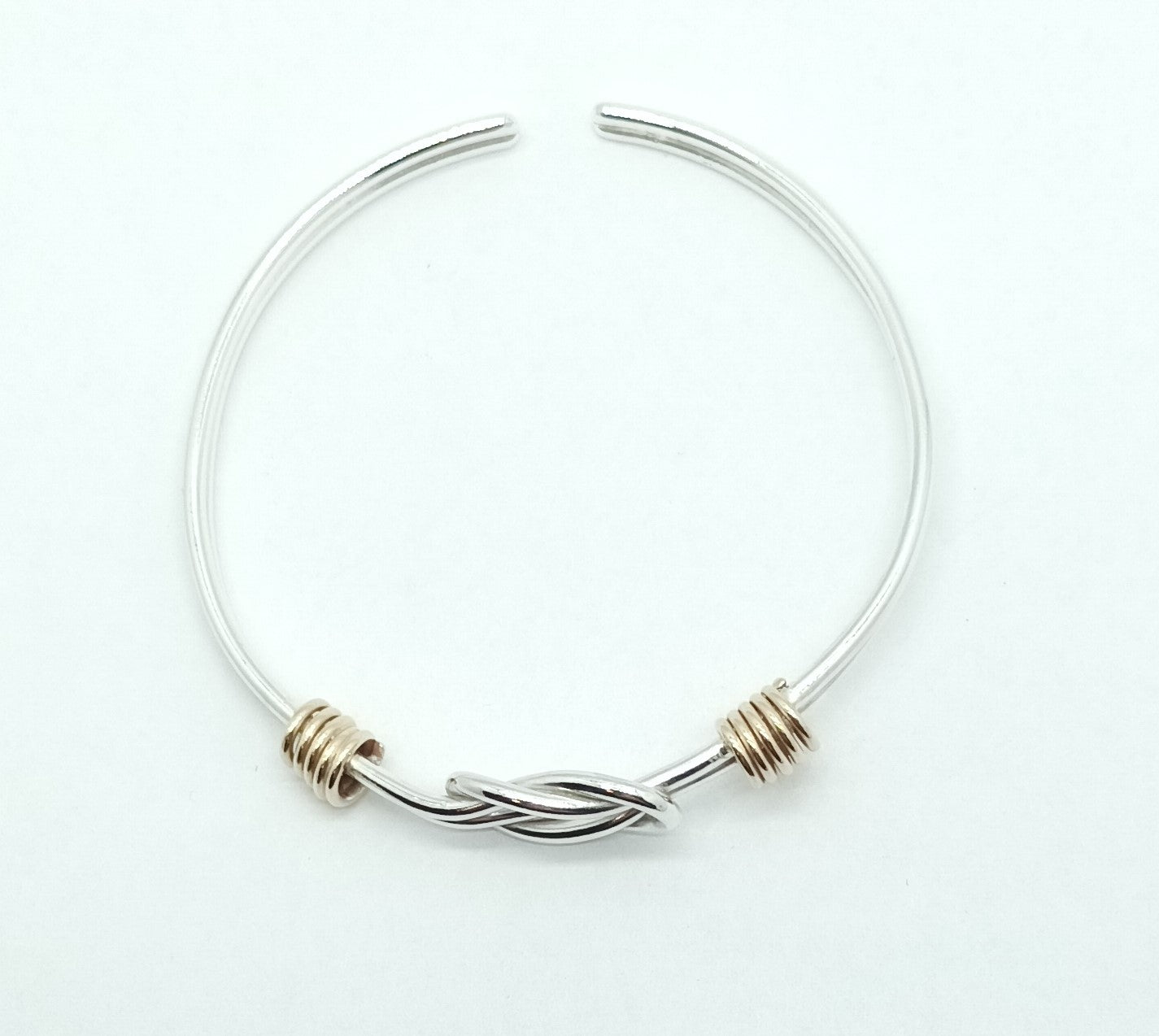 Silver Reef Knot Bangle with Gold Accents