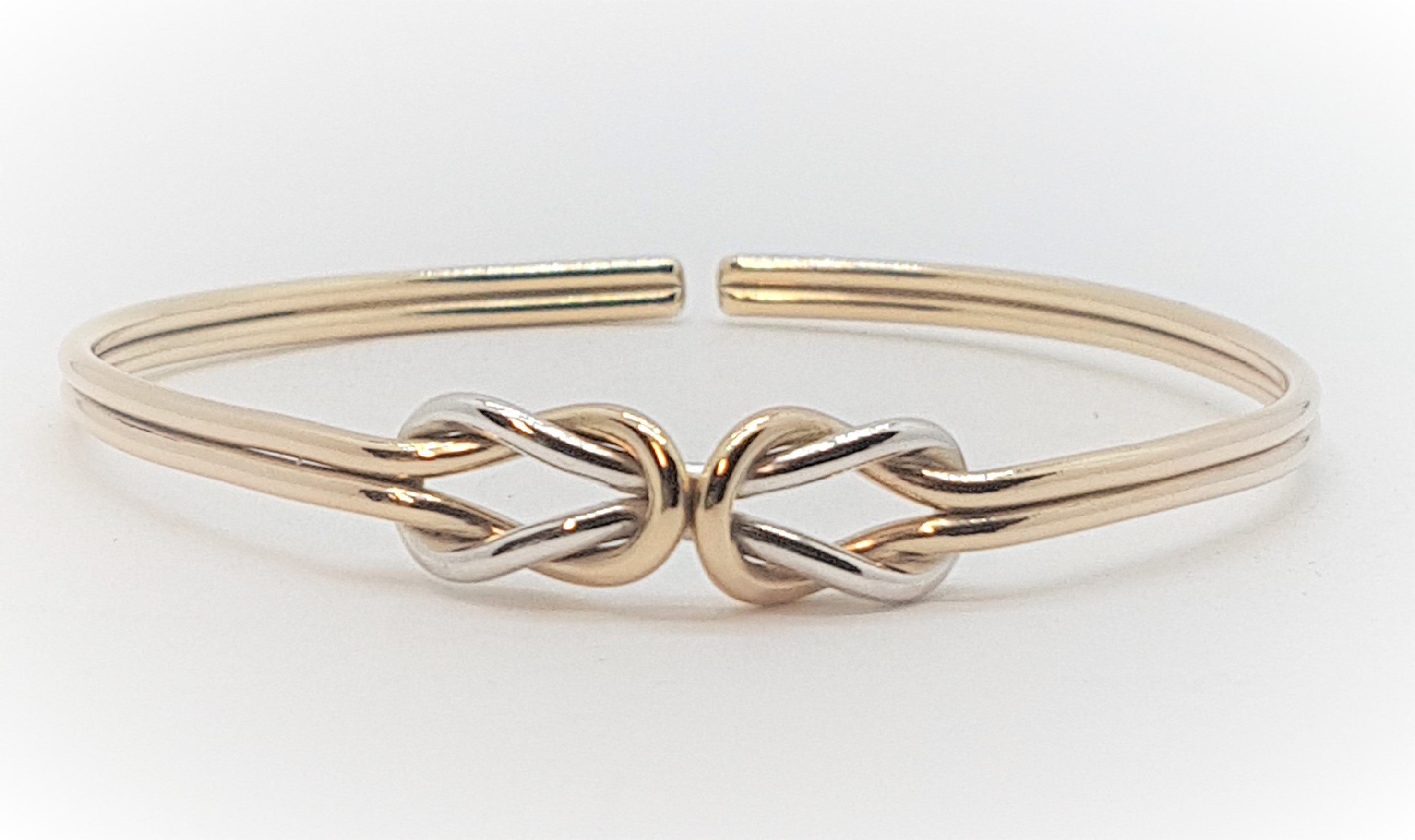 Gold and Silver Double Reef Knot Bangle