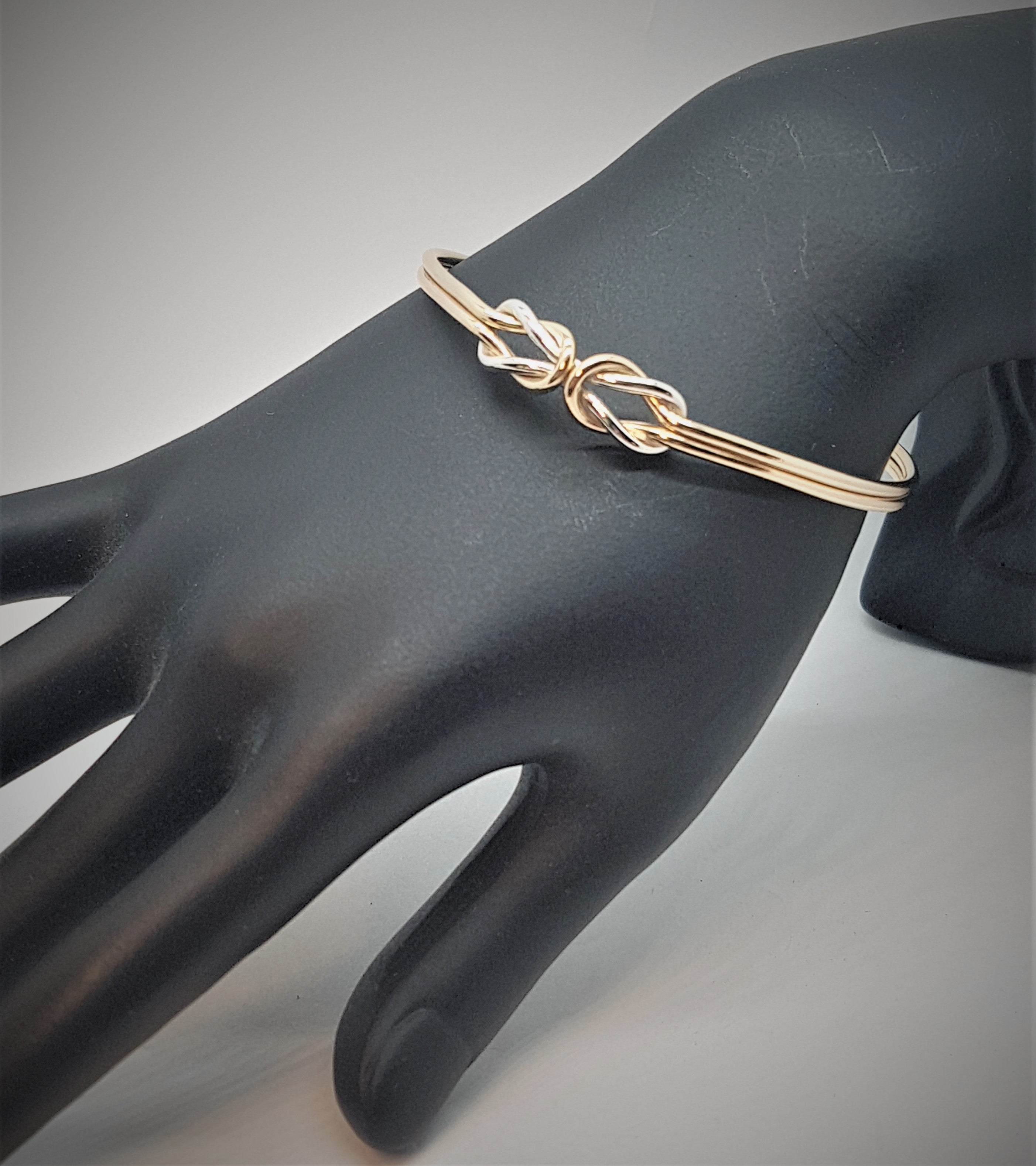 Gold and Silver Double Reef Knot Bangle